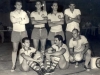 1960 – Time de futebol de salão da Liga Católica: em pé, Zé Chico, Manéco, João do Tampo e o técnico Zé Antonio; agachados, Jair Quebradas, Nêge Jacob e Ivo.