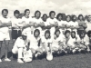 1976 – Em pé, o preparador físico Dias, Mimi, Cal, Armando, Wilson Botão, Edjalma, Everaldo, Roberto, Hildo, Carlos e o diretor Geléia; agachados, Trucão (massagista), Augusto, Adriani, Paulinho Platini, Tião Marino, Jota Lopes, Diogo e Gil.