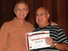 Leivinha, proprietário do Jornal MOMENTO ESPORTIVO, recebe do presidente da SES - Paulo Hoffmann, o diploma de 